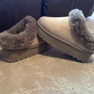 Fur booties size 7 BRAND NEW.